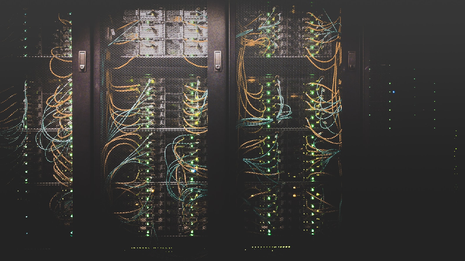 Neatly cabled network switches in a colocation cabinet — infrastructure you own, in a building you don't.